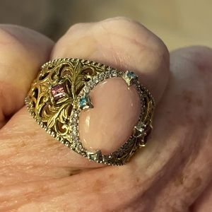 Pink Peruvian Opal ring set with blue apatite and rhodolite stones in gold over